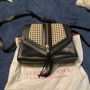 Stylish, sturdy, and roomy with lots of pockets.